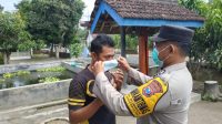 Bhabinkamtibmas Polsek Sanankulon Bagikan Maske